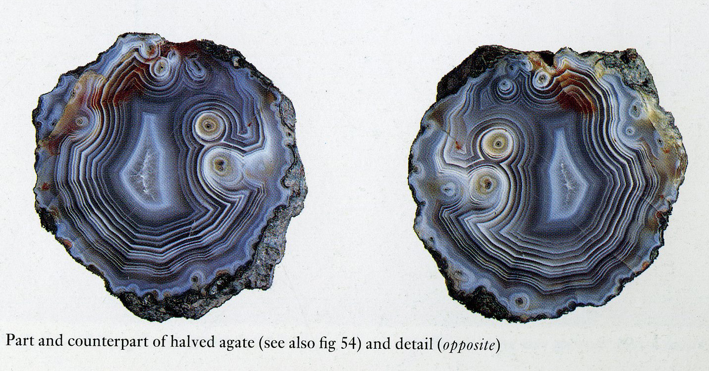 2 halves of a blue-grey agate with white banding.